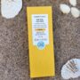 Comfort Zone Sun Soul Face Cream SPF50+ solkrem mot pigmentflekker for ansiktet, 60 ml i gul eske på sand med skjell – Nalu Nalu Frisør
